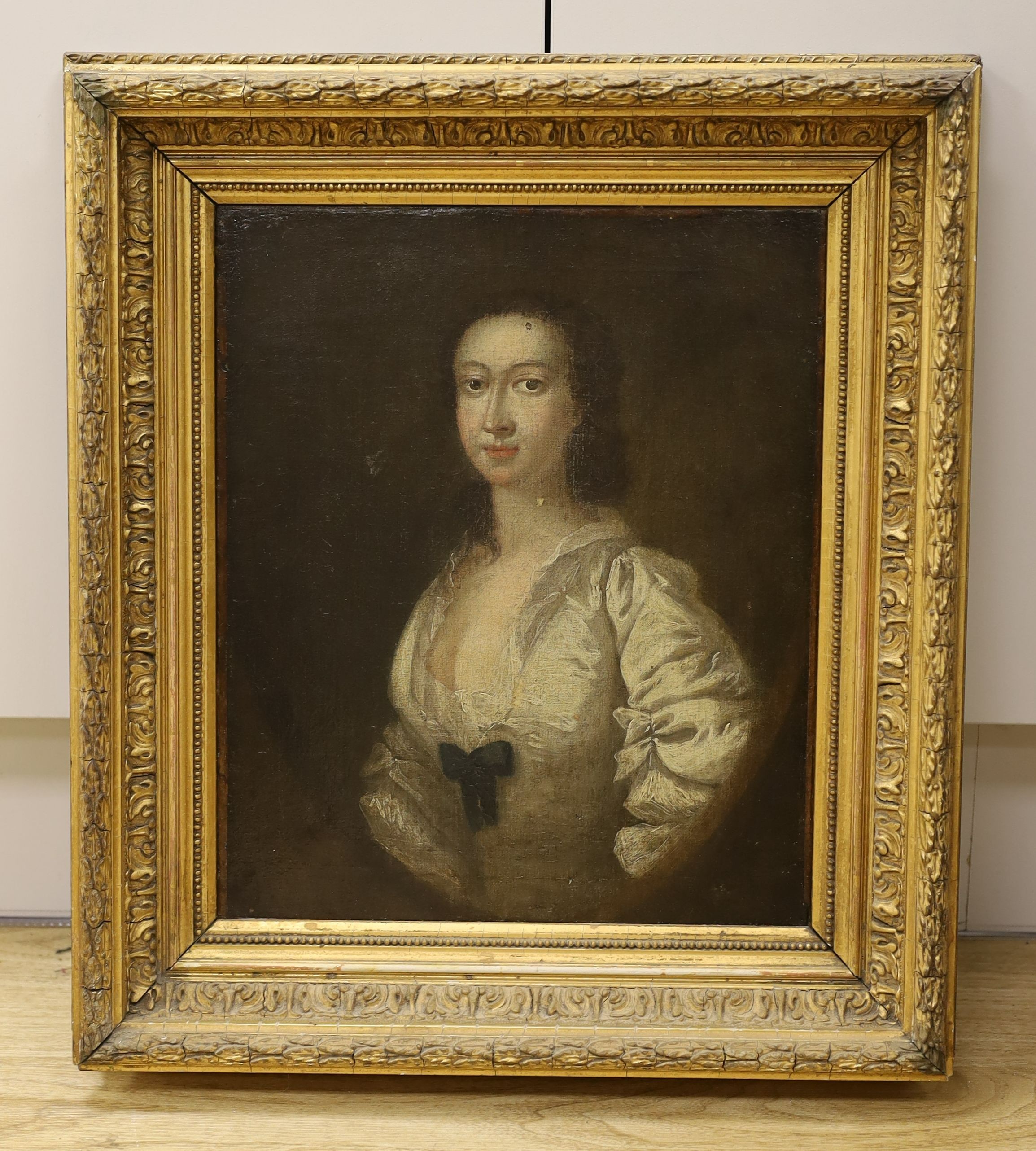 18th century English School, oil on canvas, Portrait of a lady, later inscription verso, 36 x 30cm